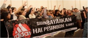 Pitt students stand in solidarity with former Adidas factory Workers.