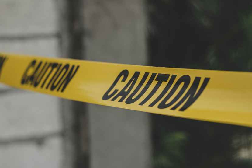 yellow and black caution sign